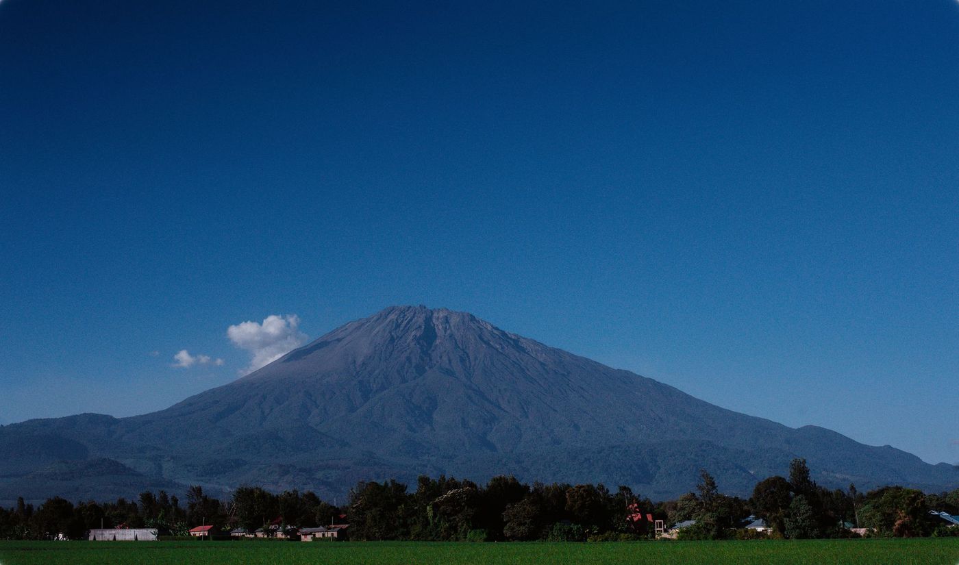 Mount Meru rising over the Arusha plains