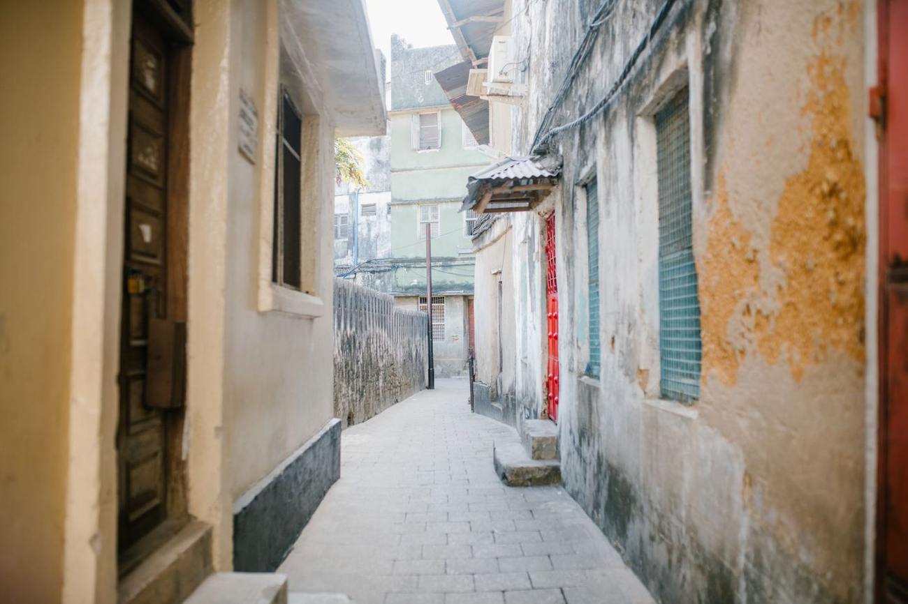 Carved-door alley in historic Stone Town, Zanzibar